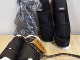 a pair of boots and a pair of boots on a table