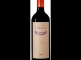 a bottle of red wine that is sitting on a table