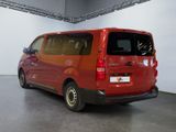 a red van that is parked inside of a building