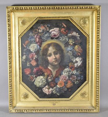 un tableau représentant un jeune garçon avec une couronne de fleurs, dans un cadre doré