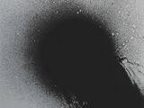an image of a black and white photo of a person ' s shadow