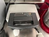 a blender that is sitting on a counter next to a mixer