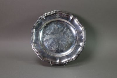 a silver plate that is sitting on a table