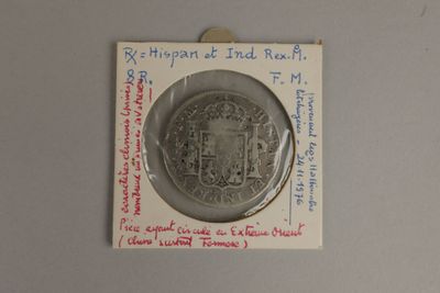 une image représentant une pièce d'argent sur laquelle figure le portrait d'un homme