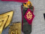 a lot of different items that are laying out on the table