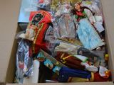 a cardboard box full of toys and other items