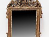 an image of a mirror with a gold frame on a white background