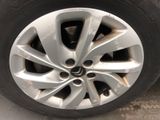 a close up of a tire on a car ' s rim