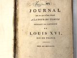 un vieux livre ouvert à la page où figure le titre d'une revue