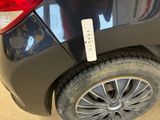 a close up of a car with a sticker on the side of it
