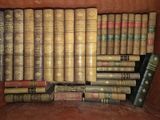 a lot of old books on the shelf together