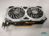 a close up of a video card with a fan on top of it