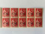 six red stamps with a picture of a man and woman on them