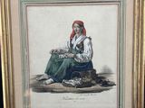 an old picture of a woman sitting on the ground next to a clock