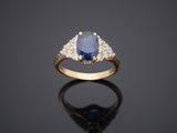 a sapphire and diamond three stone ring