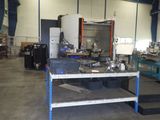 a picture of a large machine shop with a lot of equipment