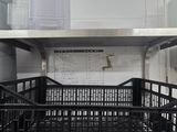 a black crate in the middle of a room