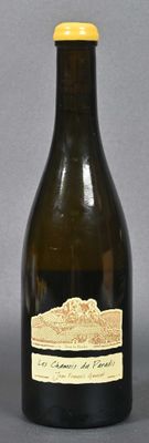 a bottle of wine that is sitting on a table