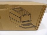 cardboard box with a drawing of a toaster and a toaster on it