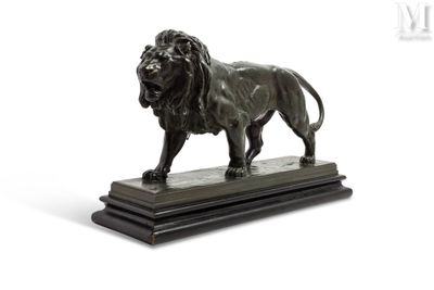 statue of a lion on a marble base on a white background