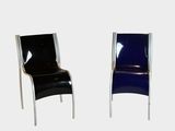 pair of black and chrome chairs against a white background