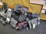 many pieces of luggage sitting on the floor next to each other