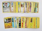a lot of pokemon cards on the table together