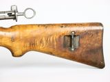 an old wooden rifle with a gun on a white background