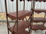 three tiered shelvings with scallops on each of them