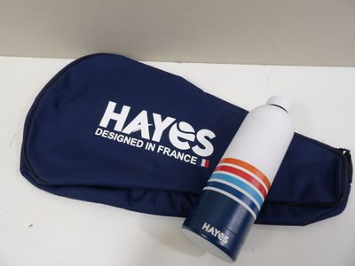 a bottle of water and a bag on a table