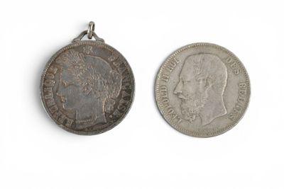 deux pièces d'argent sur lesquelles figurent respectivement la tête d'un homme et celle d'une femme