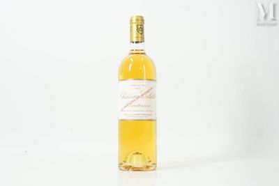 a bottle of wine that is sitting on a table