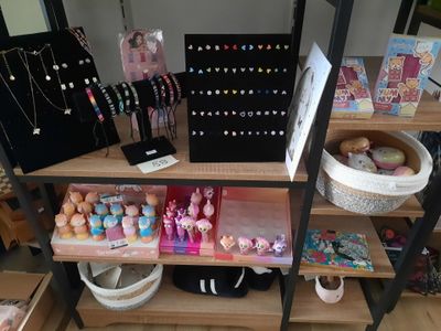 a shelf with various items on it in a room