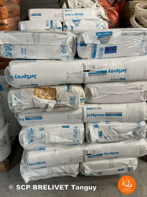 many bags of food stacked on top of each other