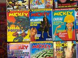 a lot of comic books on the floor on the floor