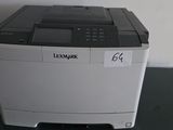 a photo of a printer sitting on top of a desk
