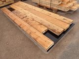many pieces of wood stacked on top of each other