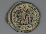 a close up of a coin with an image of a man on it