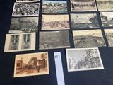 a lot of old photographs on the table