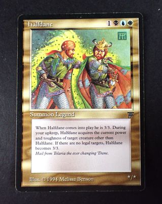 a close up of a card with a picture of two knights