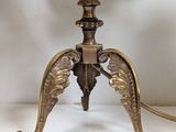 an image of a table with a lamp on top of it