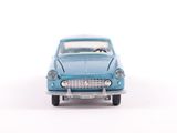 a toy car that is sitting on a white surface