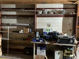 a garage with a lot of boxes and a lot of tools
