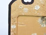a picture of a picture of a bird on a picture frame