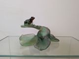 a glass table with a bird on top of it
