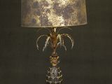 a lamp that is sitting on a white pedestal