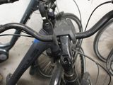 a close up of a bicycle parked in a garage