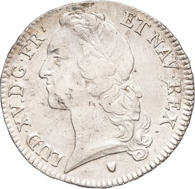 une pièce d'argent portant une tête de femme et une couronne