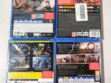 three blu - ray games are sitting on a white surface