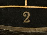 a black hat with the number 2 on it